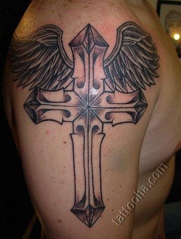 Металический крест и крылья