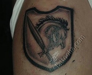 Знак лошадь, щит и мечь.