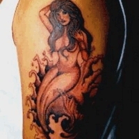 Значение и символизм татуировки русалка