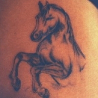 Значение татуировки лошадь