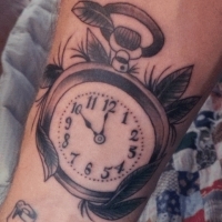 Значение и символизм татуировки часы