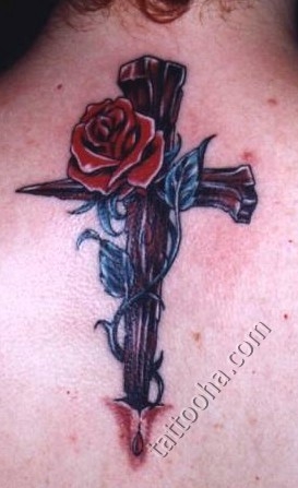 Крест из двух костылей с розой