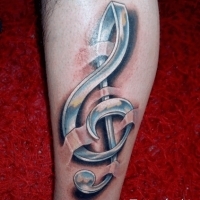 Значение и символизм татуировки скрипичный ключ