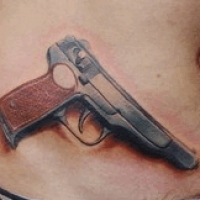 Значение и символизм татуировки пистолет