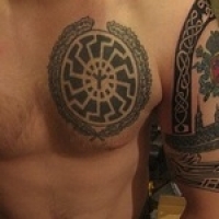 Значение и символизм татуировки чёрное солнце